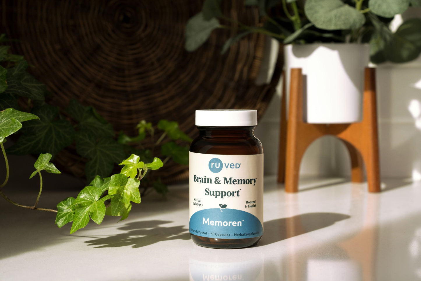 A bottle of Memorem sitting on a kitchen counter.