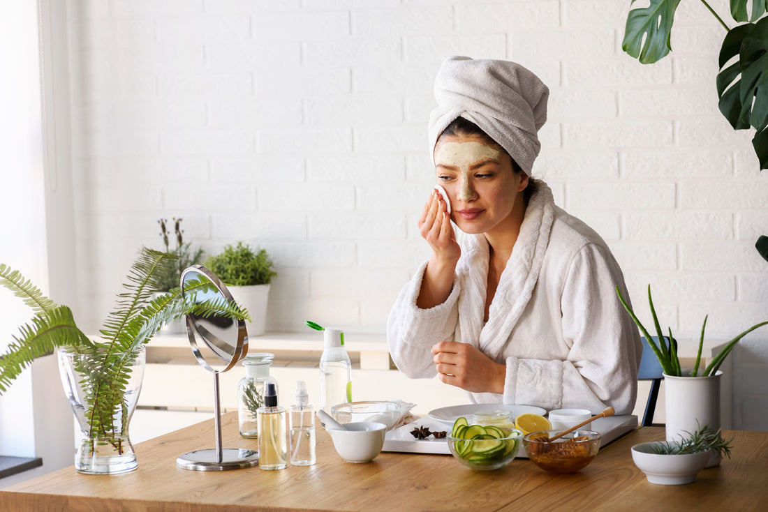 A woman doing a skincare routine using honey. 