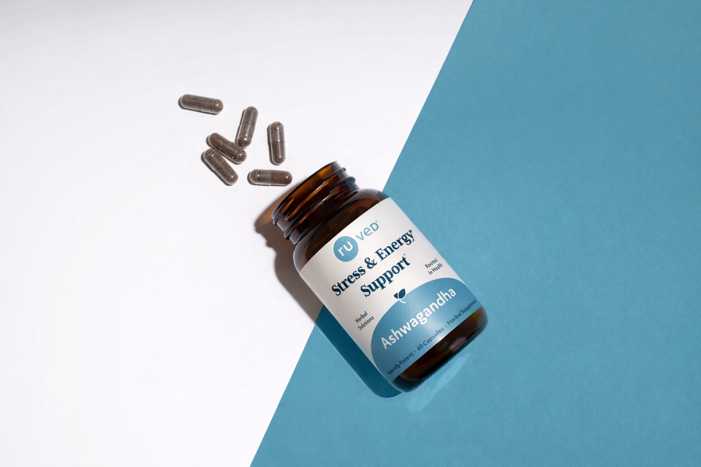 Ashwagandha Capsules Spilled on Table - Herbal Supplement for Stress Relief and Vitality, Organic Blend.